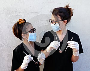 Mom with her daughter, dentist