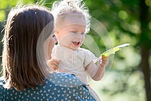 Mom holding child