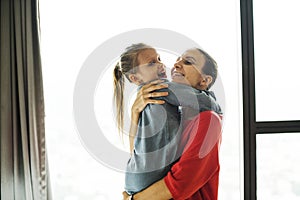 Mom holding daughter spending time together