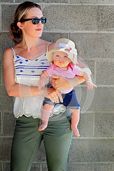 Mom Holds Young Baby