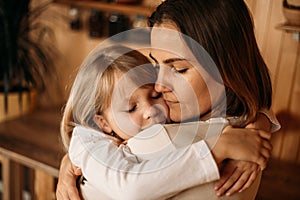 Mom hugs daughter. Happy family on mpthers day. Love mothers and daughters