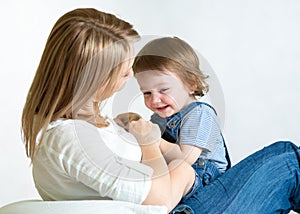 Mom and kid having fun pastime. Parenthood