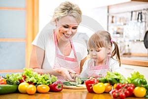 Mom and kid preparing healthy food