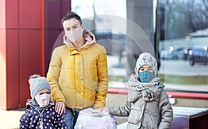 Mom and kids are shopping at the grocery store