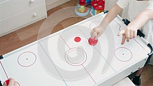 Mom likes to play air hockey with your child 1080p