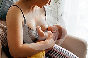 Mom and newborn baby resting after breastfeeding