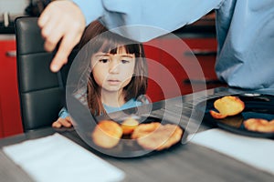 Mom Serving Family Dinner to her Happy Toddler Daughter