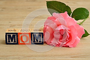 Mom spelled with colorful alphabet blocks