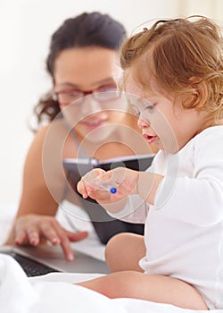 Mom, working and multitasking on laptop with baby in home for remote work or writing project. Infant, kid and mother