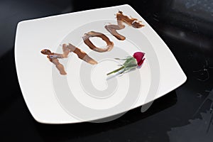 Mom Written on a Plate with Chocolate Spread by a Little Girl