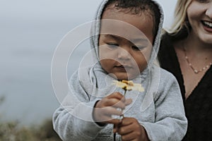 Mom with young son at a beach