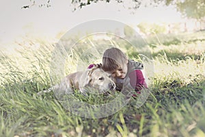 Moment of love between a boy and his dog