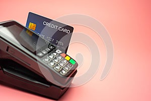 Moment of payment with a credit card through terminal, Finance concept