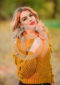 Moments of joy. warm and cosy seasonal clothes. autumn color trends. beautiful fashion model in knitwear sweater
