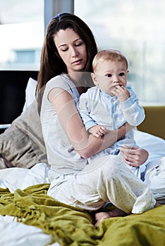 Moments in motherhood. a mother spending time with baby boy at home.