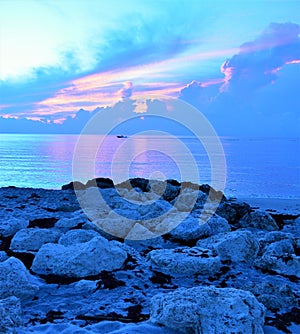 Moments before the sun rises the beach takes on a blue glow