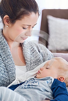 Mommy, baby and sleeping for rest in home, security and support in bonding for wellness or trust. Mother, toddler and