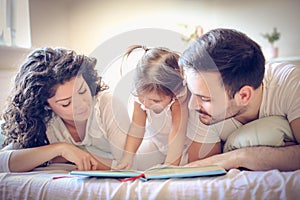 Mommy and daddy reading me a fairytale.