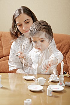 Mommy playing with daughter