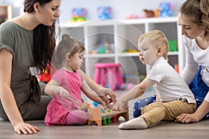 Moms with their babies in nursery