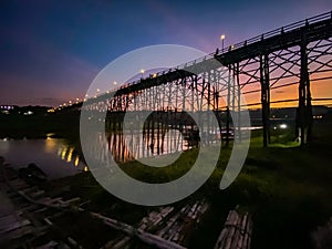 Mon Bridge, old wooden bridge at sunset in Sangkhlaburi, Kanchanaburi, Thailand