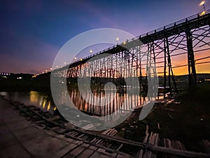 Mon Bridge, old wooden bridge at sunset in Sangkhlaburi, Kanchanaburi, Thailand