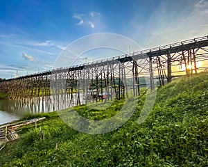 Mon Bridge, old wooden bridge at sunset in Sangkhlaburi, Kanchanaburi, Thailand