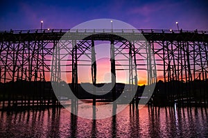 Mon Bridge, old wooden bridge at sunset in Sangkhlaburi, Kanchanaburi, Thailand