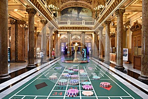 Monaco - June 20, 2019: Tourists inside the Monte Carlo Casino in Monaco