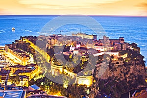 Monaco. Prince palace and old town on the hill in Monaco sunset view