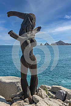 Monalisa statue on cliffs above Playa del Rey, Cabo San Lucas, Mexico