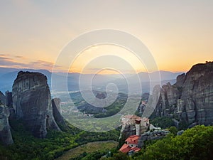 Monasteries on the rocks and beautiful sunset, Meteora, Greece