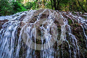 The Monasterio de Piedra park in Nuevalos, Spain, in a hundred-year-old forest full of magical waterfalls photo