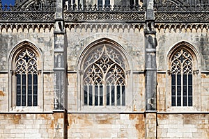 Monastery of Batalha. Gothic windows in tracery of the Capela do Fundador photo
