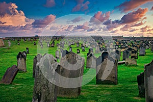 Monastery Cemetery at sunset in Whitby, North Yorkshire, UK