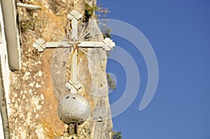 Monastery church in Montenegro built in rock. Detail of cross.