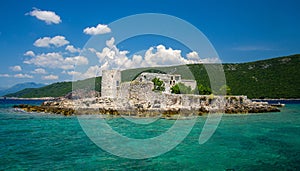 Monastery and church on island in Boka Kotor bay, Montenegro photo