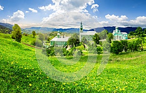 Monastery on the hillside at sunrise