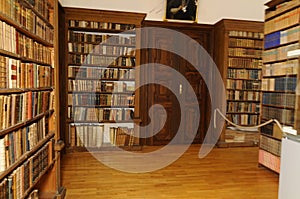 in a monastery library with books