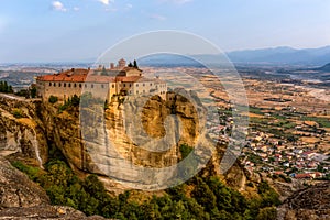 Monastery on a mountain and a city in Greece