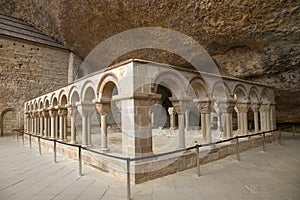 The Monastery of San Juan de la Pena, Jaca, in Jaca, Huesca, Spain, carved from stone under a great cliff. It was originally buil