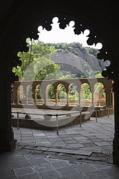 The Monastery of San Juan de la Pena, Jaca, in Jaca, Huesca, Spain, carved from stone under a great cliff. It was originally buil