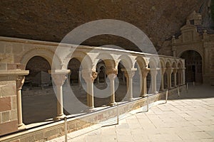 The Monastery of San Juan de la Pena, Jaca, in Jaca, in Jaca, Huesca, Spain, carved from stone under a great cliff. It was origin