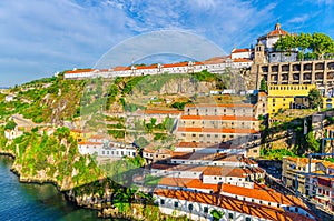 Monastery of Serra do Pilar with catholic church and winery buildings on steep slope of Douro River in Vila Nova de Gaia
