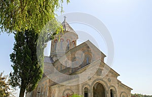 Monastery of St Nino at Bodbe. Kakheti region with people. Sighnaghi