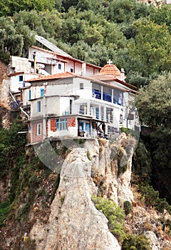 The monastic monastery located a ledge of Athos mountains.