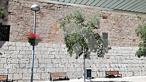 Moncerrat monastry yard. Trees and flowers