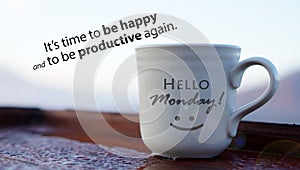 Monday quote with cup of coffee or tea - Hello Monday. It is time to be happy and to be productive again.