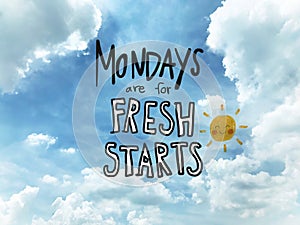 Mondays are for fresh starts word lettering and sun smile on blue sky