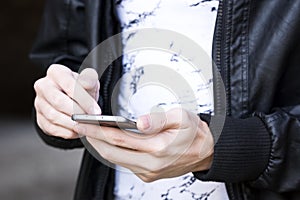 Mondern smartphone in hand of young boy